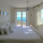 Master bedroom with stunnibg sea views